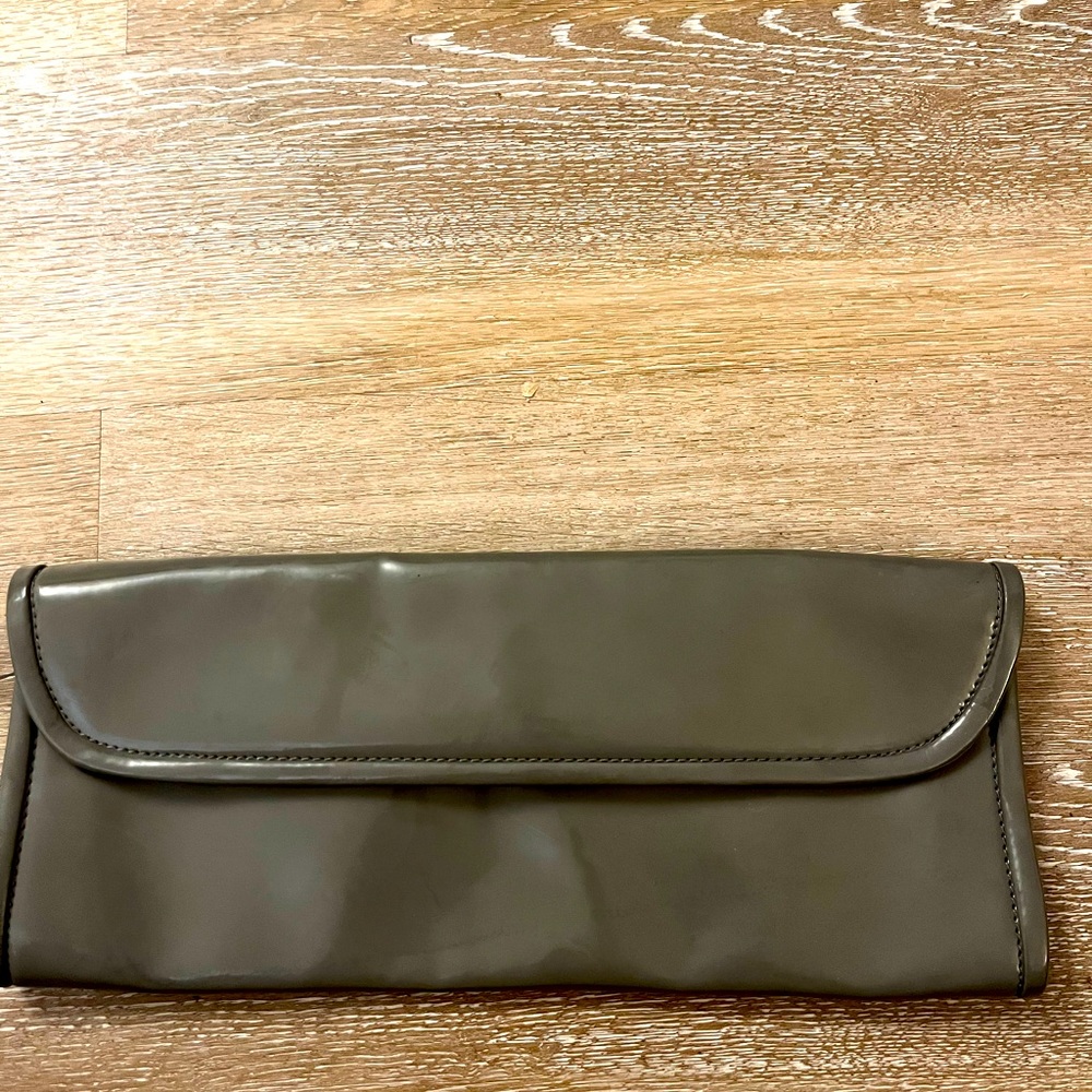 Aldo gray one button clutch. Perfect for a party or night out in the town.
